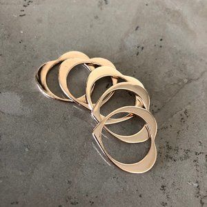 A Set of Five Heart-Shaped Stacking Rings
